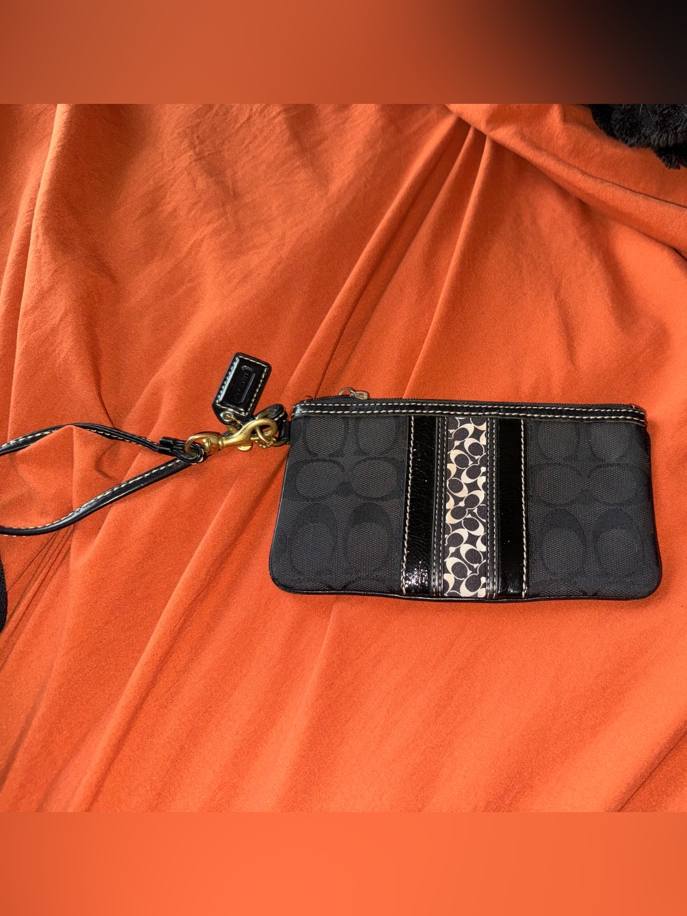Coach Hamptons signature black jacquard top zip wristlet